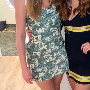 Short green floral dress from Urban Outfitters